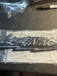 Nos New 1999 Thru 2004 Ford Lightning Pick Up Front Fender Emblem XL3Z-16720-AA. Fixed Price $45.00.