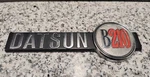 Datsun B210 Emblem Badge Logo Nameplate Vehicle Insignia 76854 H6205. Vntg. Oem. Fixed Price $34.99.