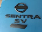 Nissan Sentra Sv 2013-19 Rear Trunk Emblem Pure Drive Logo Black Lettering Oem. Fixed Price $43.95.