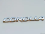 Emblem Badge Rear Back Letters Luggage Plate 75442-02380 Toyota Corolla 20-26. Fixed Price $38.00.