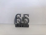 Pontiac Grand Am 9658313 6.5 Litre Emblem Metal Part 1973-74-75. Fixed Price $50.00.