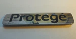 1999-2003 Mazda "protege" Trunk Emblem P/n Bjoe 51 720 With Pins!. Fixed Price $9.99.