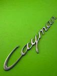 09 12 Porsche Cayman Satin Aluminum Trunk Emblem 98755923901. Fixed Price $50.00.