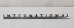 International Harvester Emblem 96905-H Script 1941-1957 Travelall Travelette. Fixed Price $40.00.