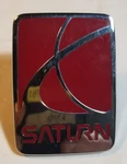 Oem Gm Saturn 21049052 Front Quarter Panel, Bumper Emblem. Fixed Price $14.95.