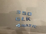 Mercedes W164 W204 Hatch GL350 / GLK350 4MATIC Rear Gate Emblems Used Oem. Fixed Price $19.99.