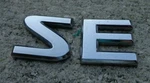 Nissan Se Emblem Letters Badge Logo Pathfinder Armada Oem Genuine Original. Fixed Price $14.83.