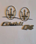 Genuine Oem 2014-2016 Maserati Ghibli Q4 Chrome Emblem Set 670008315. Fixed Price $55.00.