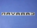 Genuine Mopar Caravan Nameplate 5113305AA. Fixed Price $91.84.