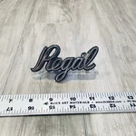 1973 1977 Buick Regal Front Emblem Script 1253959 Badge Nameplate. Fixed Price $19.99.