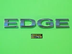 Ford Edge Liftgate Rear Emblem Badge Logo Nameplate 2007-2010 New 7T4Z-7842528-A. Fixed Price $19.00.