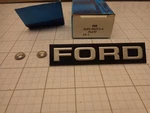 Ford Oem Nos E1FZ-8A223-A Emblem Name Plate Front Grill Some Escort 81 82. Fixed Price $22.99.