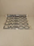 New Lot Of 2000-2005 Saturn Rear Emblem Badge Letters Oem. Fixed Price $99.80.