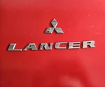 2002-2007 Mitsubishi Lancer Chrome Trunk Emblem Logo Badge Nameplate Oem. Fixed Price $35.00.