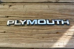 4270952 Plymouth Grille N/pl 1985-90 S Body. Fixed Price $16.00.