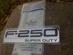 New Oem Ford F-250 Super Duty Tailgte Emblem 5C3Z-9942528-DA 2005-2007. Fixed Price $105.00.