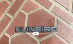 1988-1994 Pontiac Sunbird Side Door Rear Trunk Emblem Oem #20712574. Fixed Price $12.99.