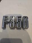 Ford Oem 1973-1979 F-350 Vintage Fender Emblem Badge Logo Name D4TB-16702-KBC. Fixed Price $34.99.