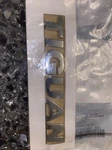 Genuine Volkswagen Nameplate 5NA-853-687-2ZZ. Fixed Price $30.00.