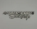 Volkswagen Beetle Automatic Stickshift Emblem 113853675A. Fixed Price $125.00.