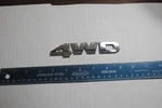 Factory 2001-- 2006 Mazda Tribute 4WD Emblem. Fixed Price $10.00.