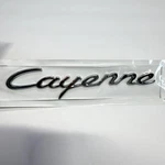 Genuine Porsche Cayenne Rear Trunk Emblem Chrome 2011-2017+ 95855967501. Fixed Price $79.99.