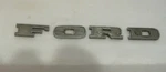 Vintage Ford Emblem Letters Part No. G7TB-16606 Script Metal. Fixed Price $55.00.