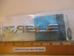 Ford 1996/1997 Mercury Sable Rear Bumper-emblem/badge "name Plate" Unopened Nos. Fixed Price $26.95.