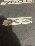 51-14-3-330-132 Genuine Bmw Emblem For E83 X3 Series. Fixed Price $65.00.