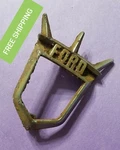 BIN7 55 1956 1957 1958 Ford Crown Victoria Thunderbird Emblem Bezel BN-7925666-B. Fixed Price $18.99.