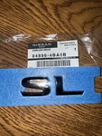 Genuine Nissan "sl" Nameplate 2014-2023 Rogue P/n: 84896-4BA0B. Fixed Price $49.99.