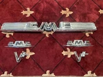 1959 Gmc Truck Hood & Fender Emblems (2374613) (2362154) (2362169) New Chrome. Fixed Price $1100.00.
