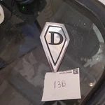 Vintage Datsun Shield Emblem Badge ..F-10? 65827M3700. Fixed Price $45.00.