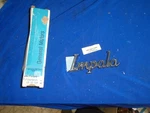 Nos 1979 Impala Side Molding Emblem 20079926. Fixed Price $45.00.