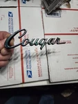 Nos 1977 1978 Mercury Cougar Trunk Emblem Nameplate Badge Ford D7WB-6542550-AWA. Fixed Price $69.00.