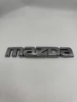 Genuine Oem BN8V-51-710A "mazda" Nameplate Emblem Badge 2004-2009. Fixed Price $7.98.