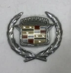 1984 1985 Cadillac Eldorado Rear Trunk Lock Wreath Emblem Badge Oem. Fixed Price $64.95.