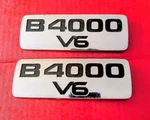 Mazda B4000 V6 Fender Emblem Badge Chrome Set (scratches) Adhesive Included. Fixed Price $29.50.
