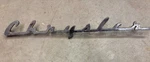 1950 Chrysler New Yorker Emblem 1331621. Fixed Price $70.00.
