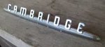 1951 Plymouth Cambridge Nos Mopar Front Fender Emblem Nameplate 1373035. Fixed Price $89.99.