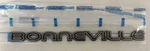 1992 Pontiac Bonneville Se Door Emblem Nameplate Black New 25552543. Fixed Price $19.99.