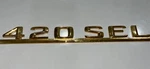 Rear Lid Model Badge 126-817-20-15 For Mercedes-benz 420SEL 1986-1991. Fixed Price $26.36.