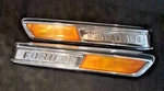 Vintage Pair Of 1968 Ford F-100 Fender Emblems With Organge Reflectors. Fixed Price $65.00.