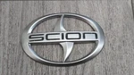 Oem 04-06 Toyota Scion Rear Hatch Emblem Nameplate 75441-52070 Back Door Badge. Fixed Price $19.99.