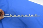Original 1957 Chevy Chrome " Chevrolet Script Emblem # Gm 3733212 - Good Shape. Fixed Price $25.00.