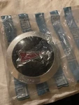 Genuine Pontiac 6000 Le Se Ste Wheel Center CAP1988,1987 GM#10064832 Unopened. Fixed Price $10.00.