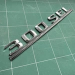 Mercedes Emblem 300SEL Lettering W126 Chrome Type Sign Plastic. Fixed Price $78.93.