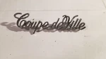 Original 1970-84 Cadillac Coupe De Ville Sail Panel Emblem Gm 9881196 Qty. Fixed Price $20.00.