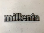 1999-2001 Mazda Millenia Rear Trunk Badge Logo Emblem P# T03451721 Genuine. Fixed Price $14.95.