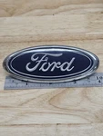 90S Ford Rear Trunk Emblem F8CB-8C046-AA 80S Mustang Fox E8ZB-8C046-A Used Nice. Fixed Price $12.00.